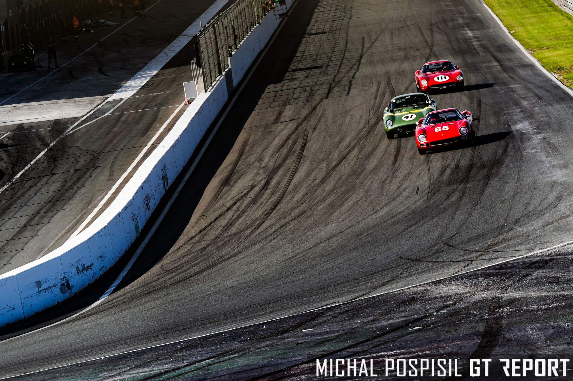 Buurman in Ferrari 250 LM, Hart in Shelby Cobra and Pastorelli in Ferrari 250 GTO '64 in close battle